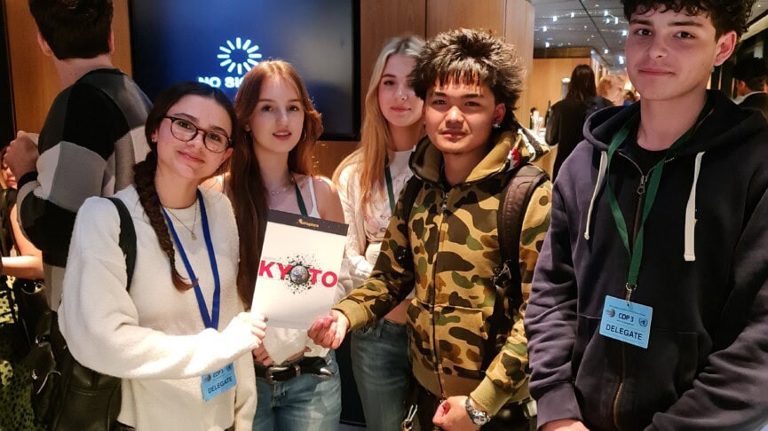 Students Stadning In The Lobby Of A Theatre